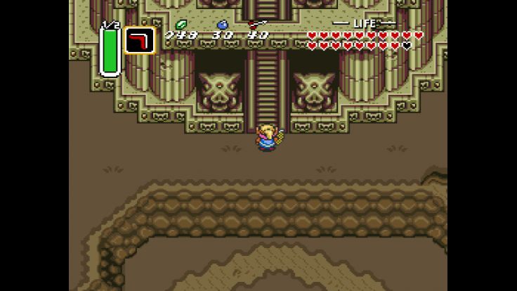 Link faces the entrance of Ganon's Tower.