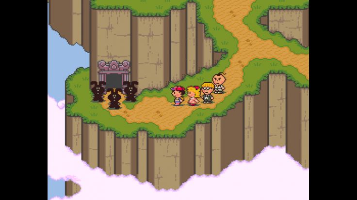 Ness and his friends approach the rabbit statues blocking the entrance to the cave in Dalaam.