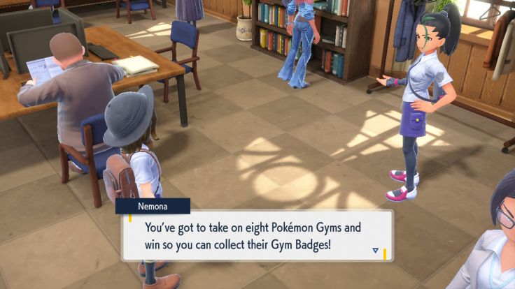 Nemona tells you about winning Gym Badges so you can take the Champion Assessment.