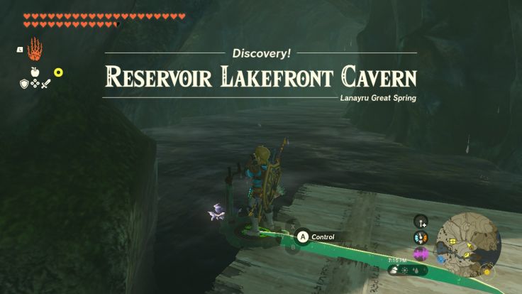 The entrance to Reservoir Lakefront Cavern is in the northeast part of East Reservoir Lake, beneath Shatterback Point.