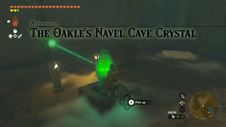Within Oakle's Navel Cave, you find a glowing green crystal, and a mysterious voice tells you to take it to where the beam shines.