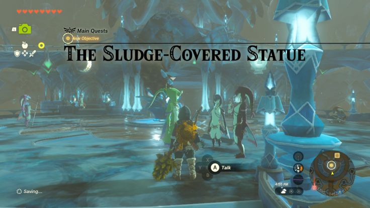 When you arrive in Zora's Domain, you find some Zora discussing the statue that they have been unable to wash clean.